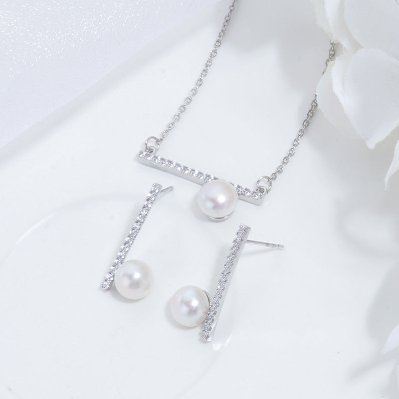 Balance Beam Pearl Stud Earrings