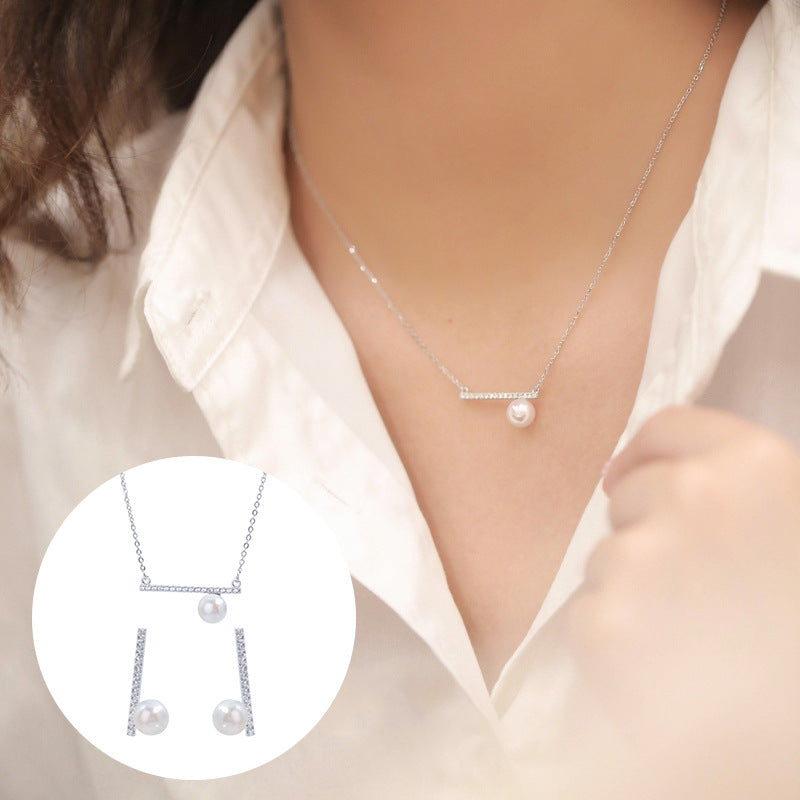 Balance Beam Pearl Stud Earrings