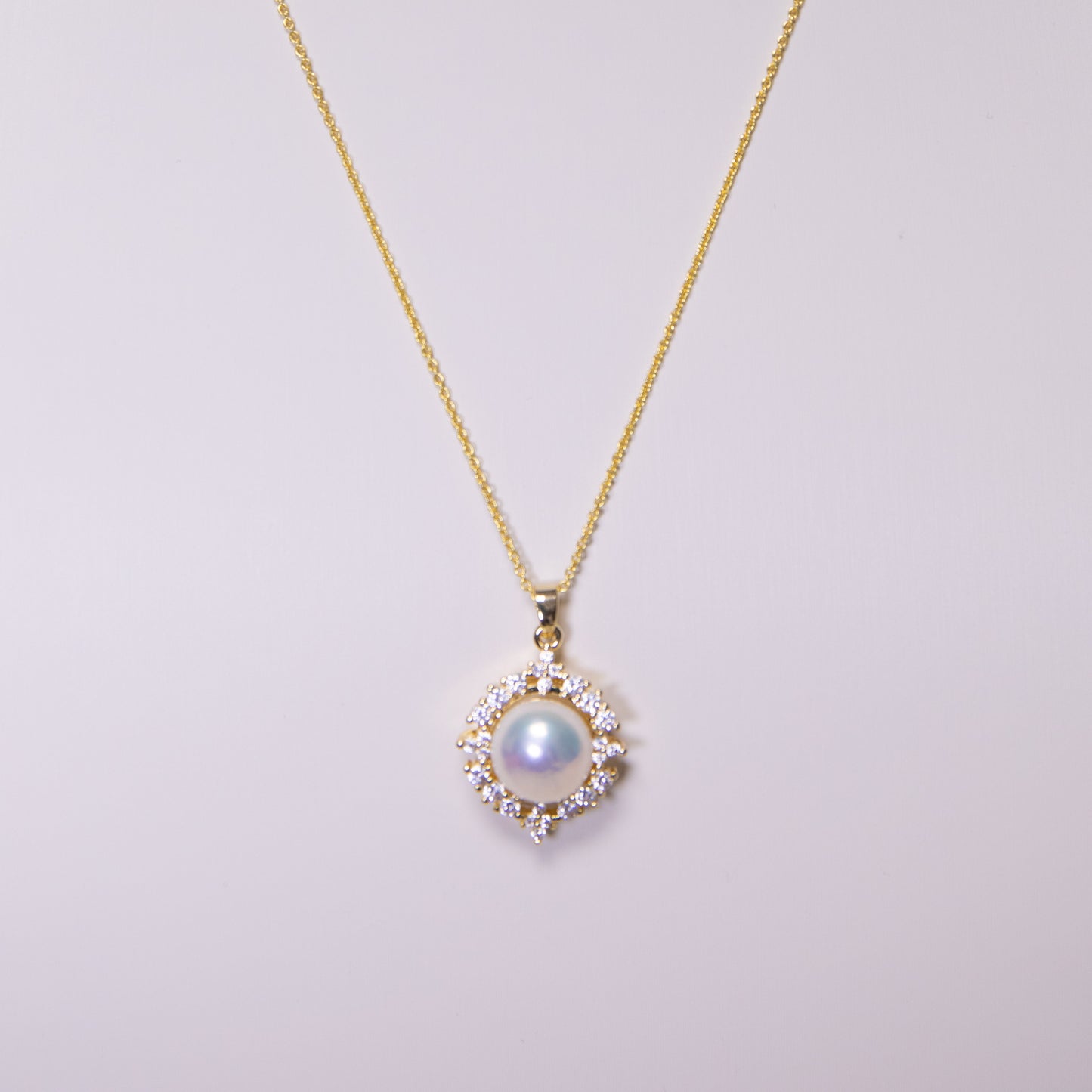 10-11mm Round White Pearl Pendant on Rhombus Zircon setting