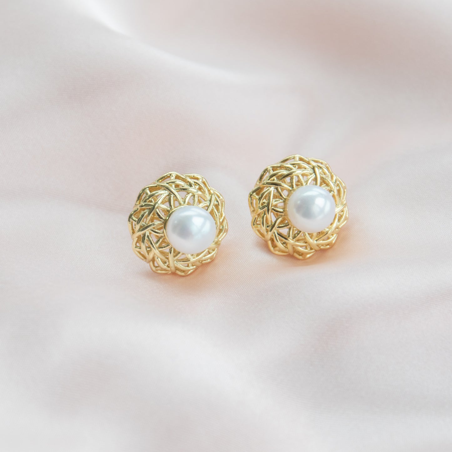 Round pearls on Bird Nest Setting