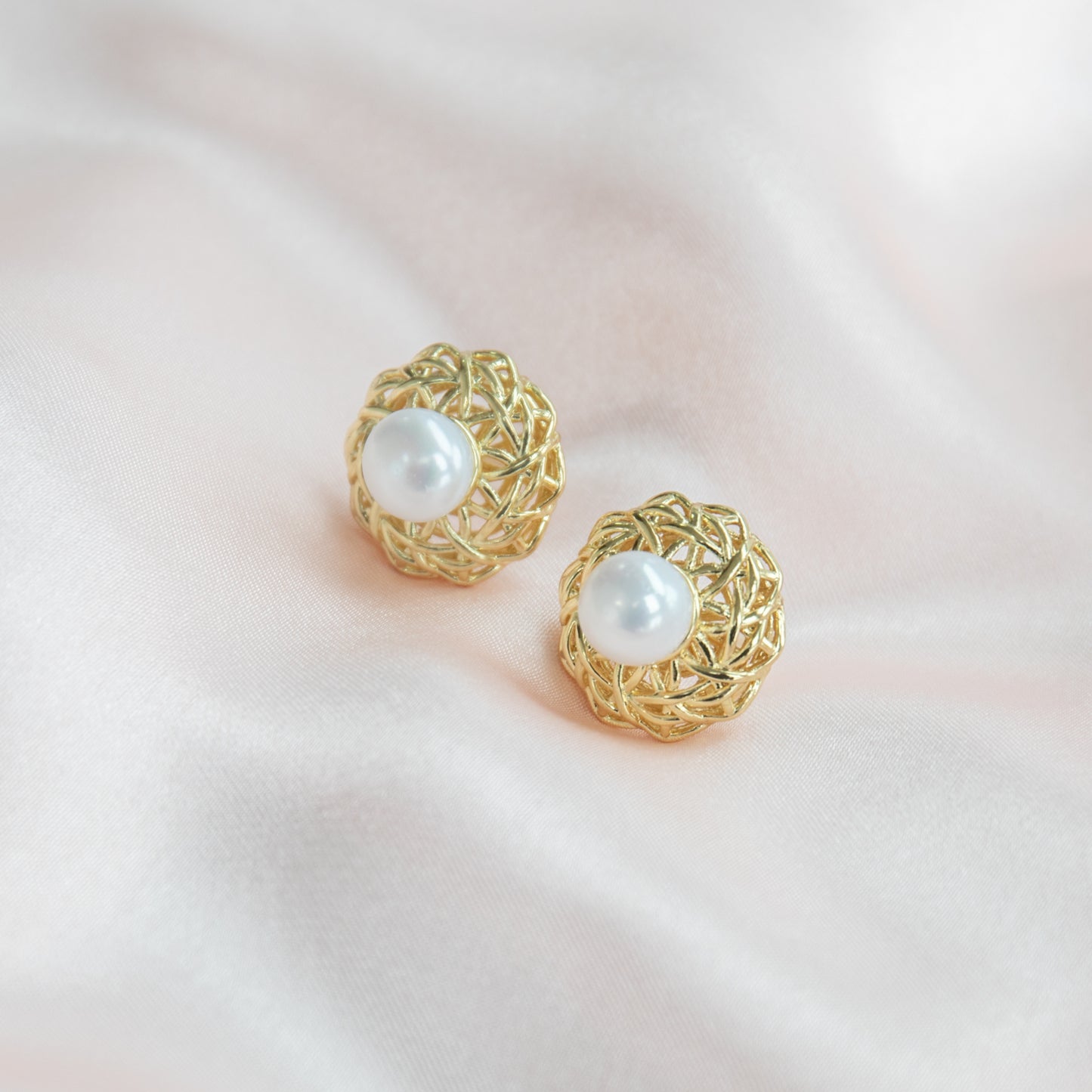 Round pearls on Bird Nest Setting