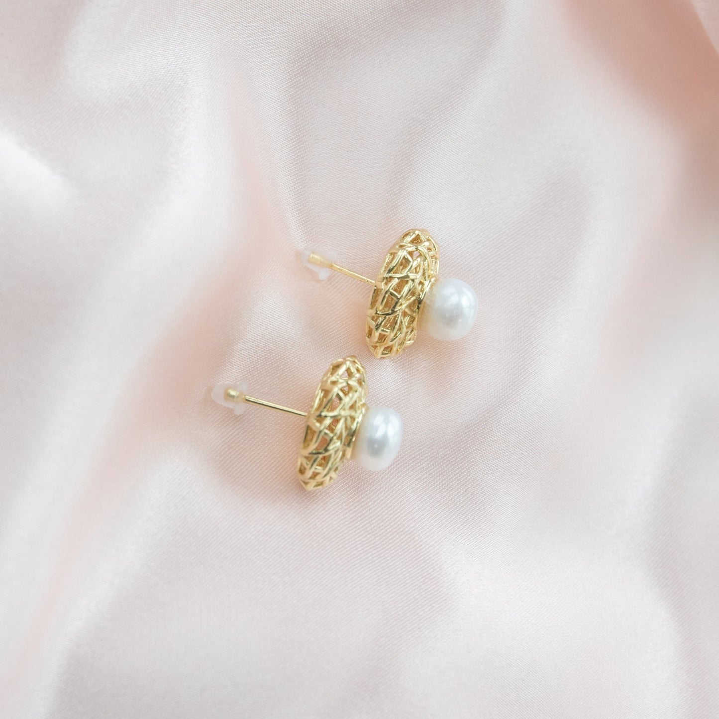 Round pearls on Bird Nest Setting